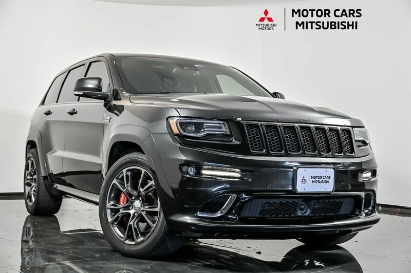 Used 2016 Brilliant Black Crystal Pearl Coat Jeep SRT image 1