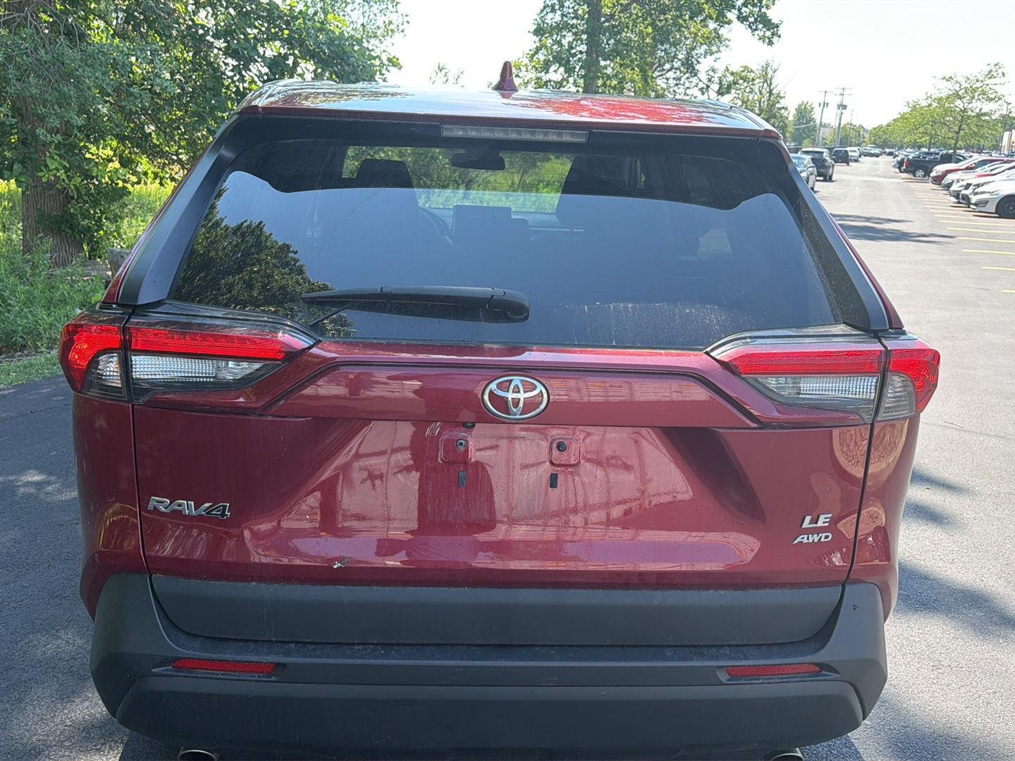 Used 2023 Ruby Flare Pearl Toyota LE image 5