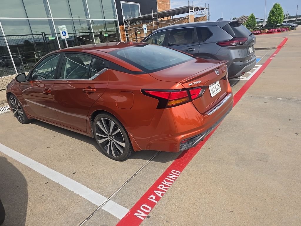 Certified Used 2022 Orange Nissan 2.5 SR image 1