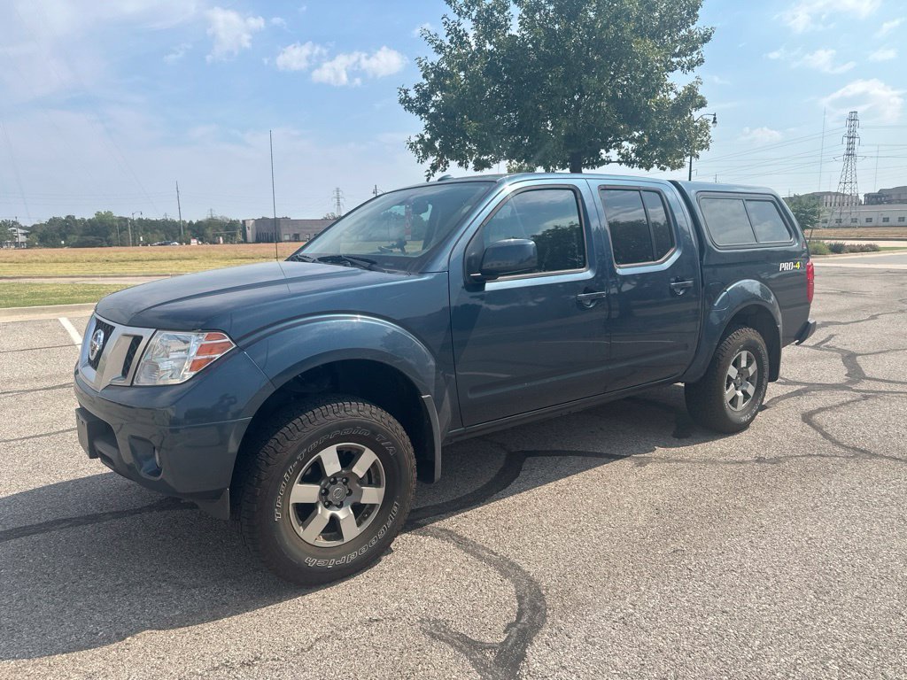 Used 2013 Blue Nissan PRO-4X image 1