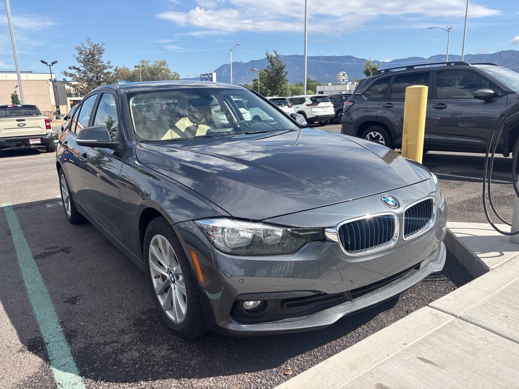 Used 2017 Gray BMW 320i xDrive image 1