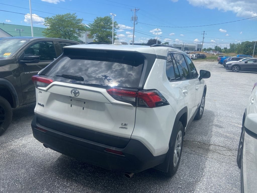 Used 2021 Super White Toyota LE image 5
