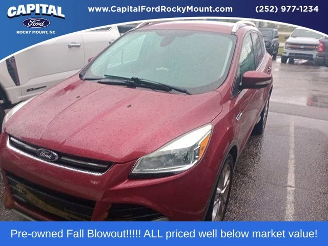 Used 2015 Red Ford Titanium image 1