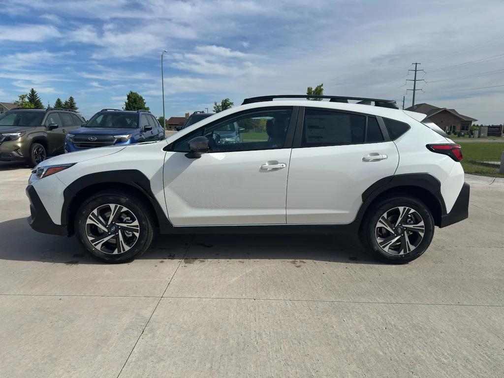 New 2026 CRYSTAL WHITE PEARL Subaru Premium image 1