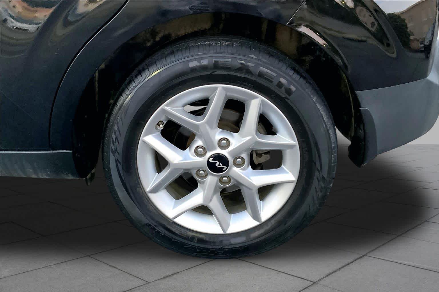Used 2022 Cherry Black Kia LX image 10