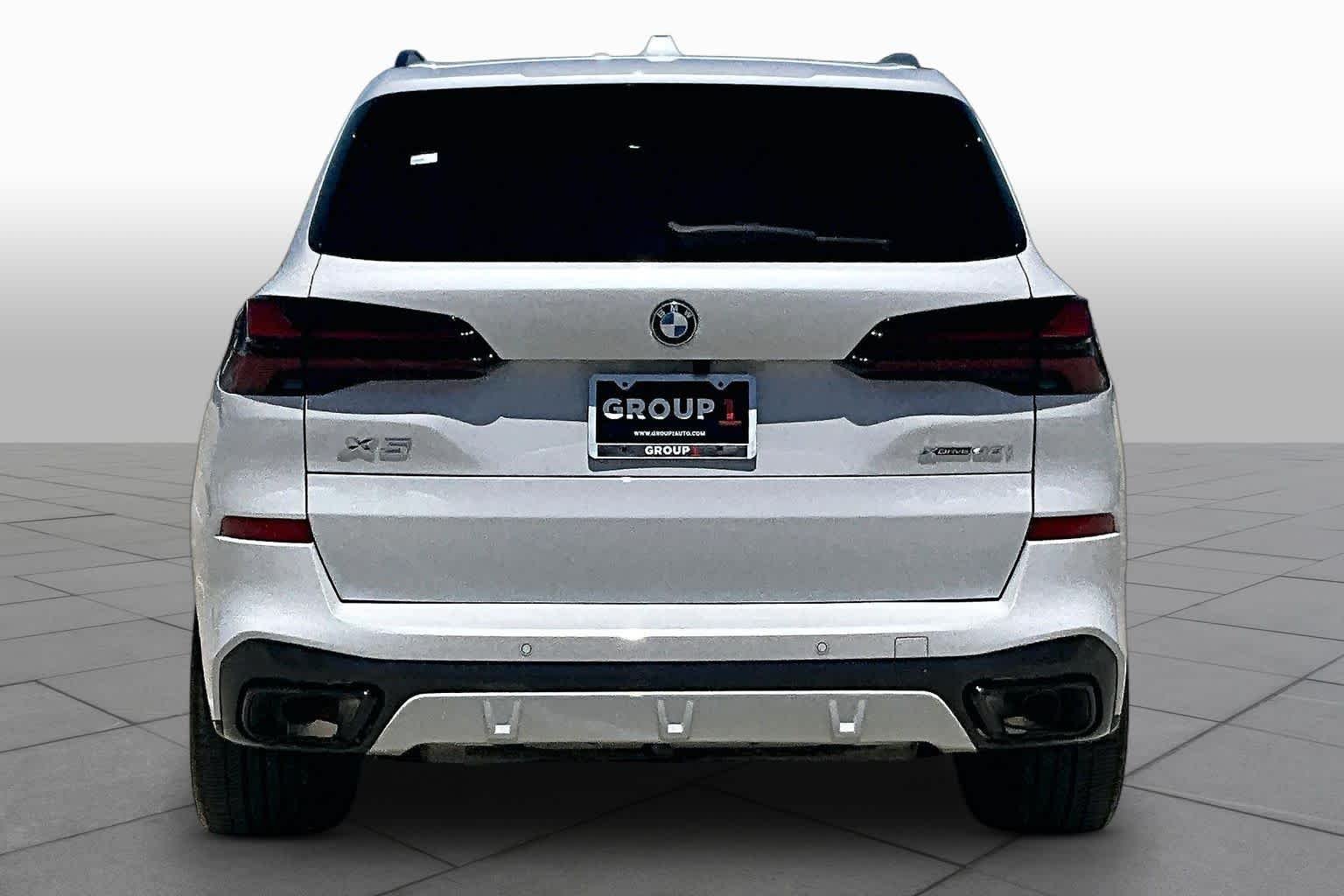 Used 2024 Mineral White Metallic BMW xDrive40i image 4