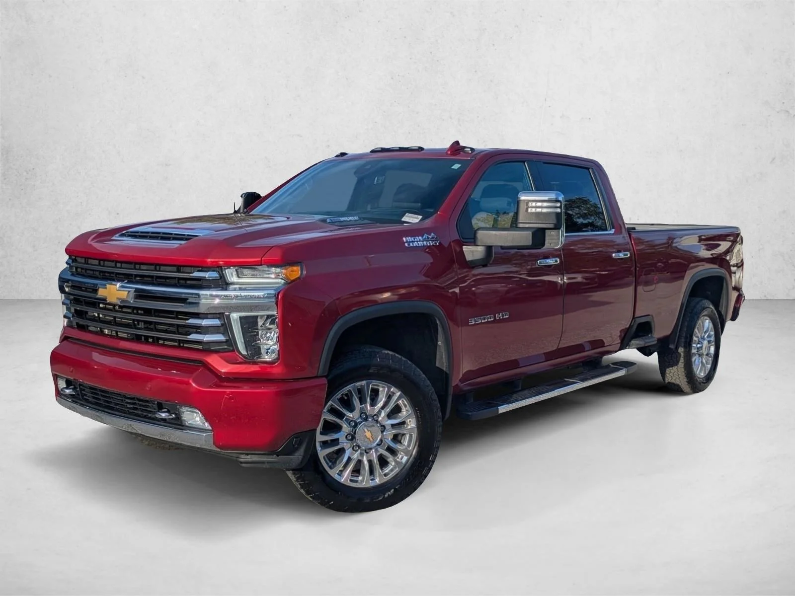 Used 2022 Cherry Red Tintcoat Chevrolet High Country image 1