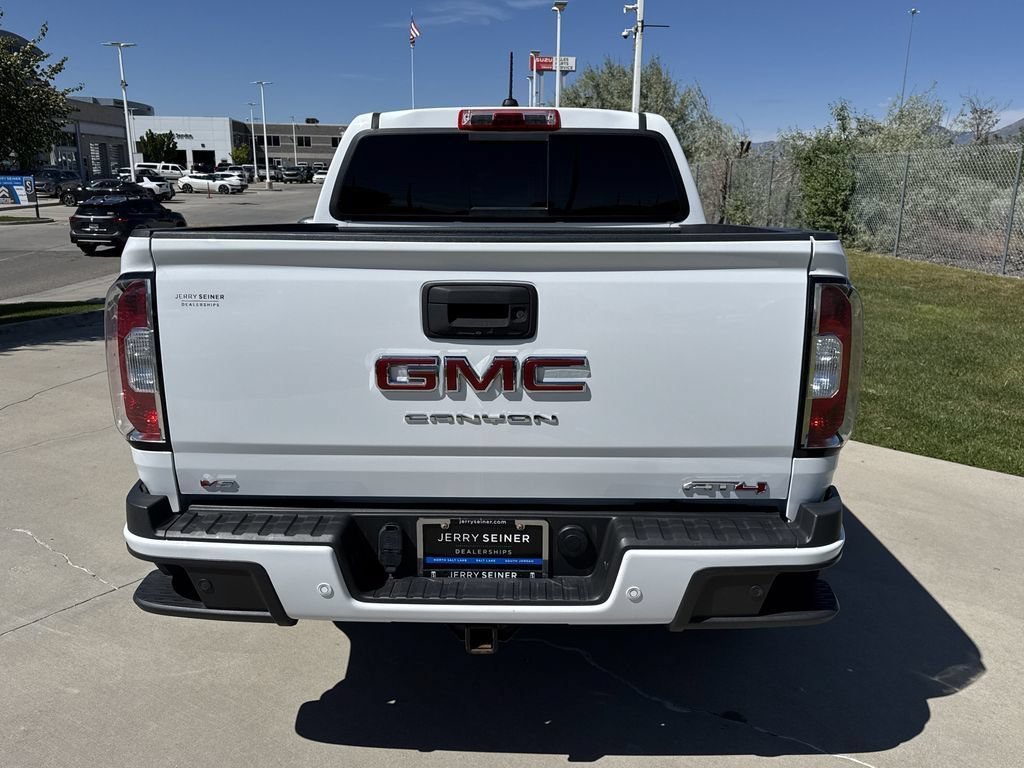 Certified Used 2022 Summit White GMC 4WD AT4 w/Leather image 6