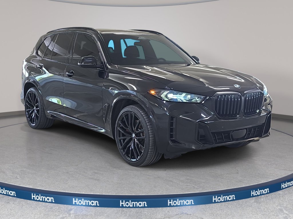Certified Used 2025 Black Sapphire Metallic BMW sDrive40i image 4