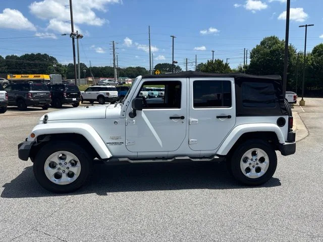 Used 2014 White Jeep Unlimited Sahara image 5