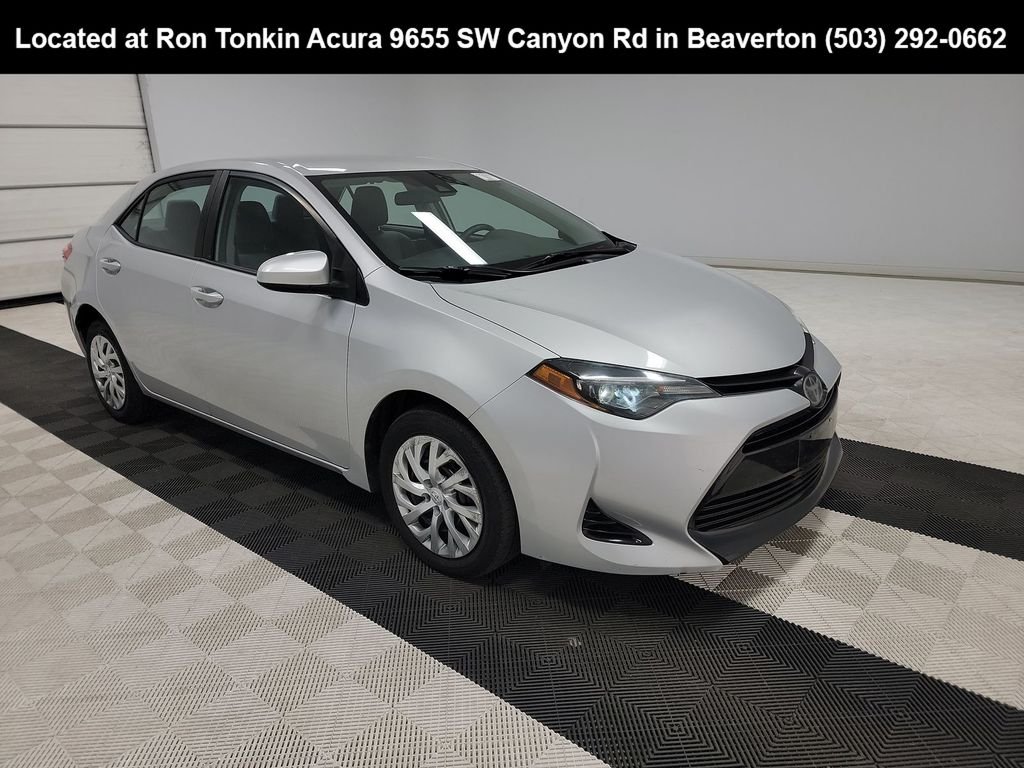 Used 2019 Classic Silver Metallic Toyota LE image 1
