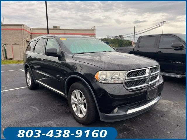 Used 2013 Black Dodge SXT image 1