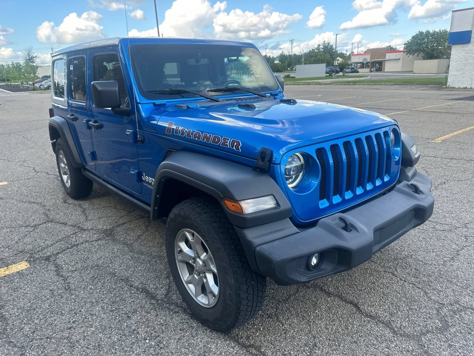 Used 2021 Hydro Blue Pearlcoat Jeep Unlimited Islander image 16