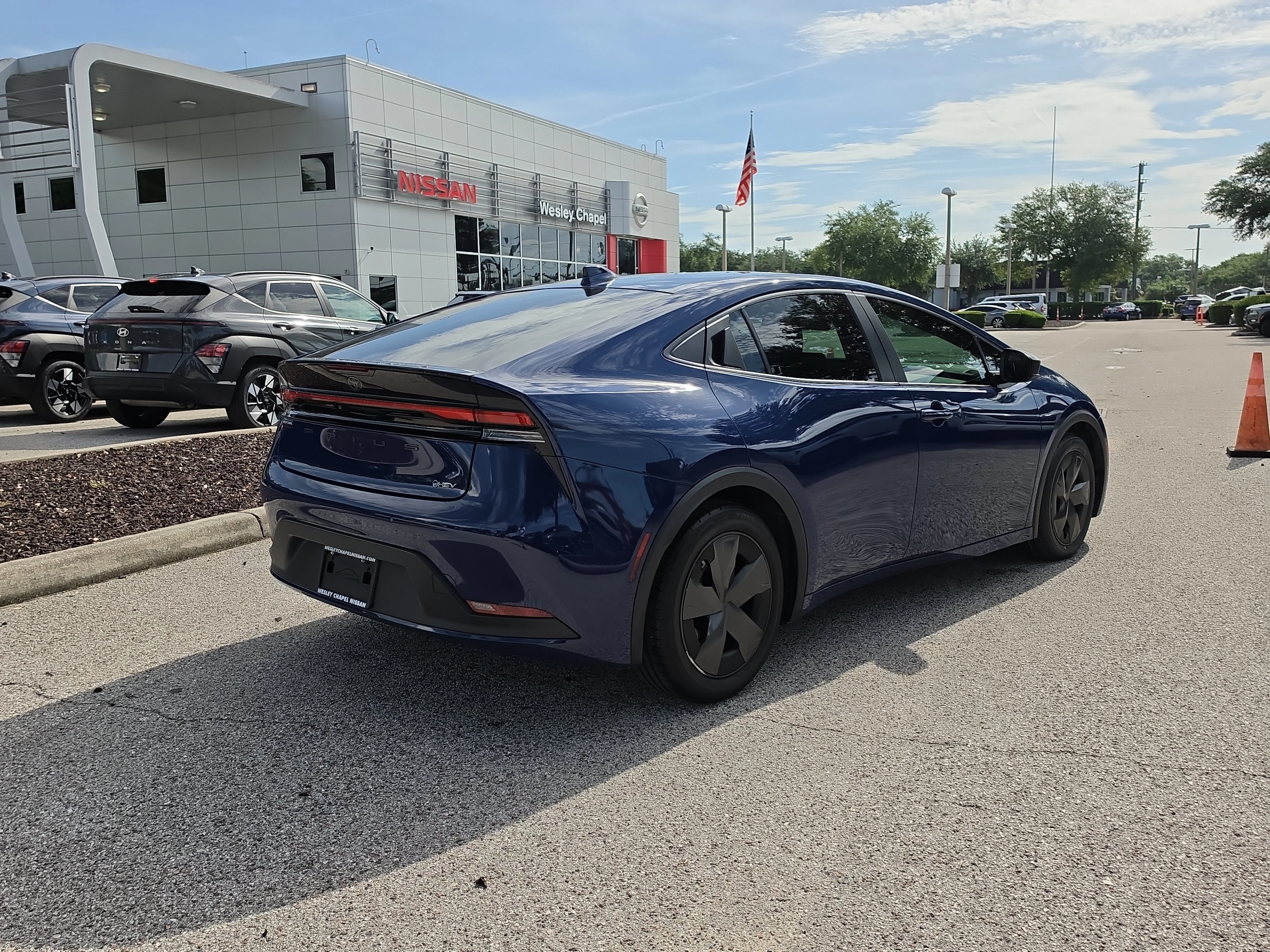 Used 2024 Reservoir Blue Toyota LE image 8