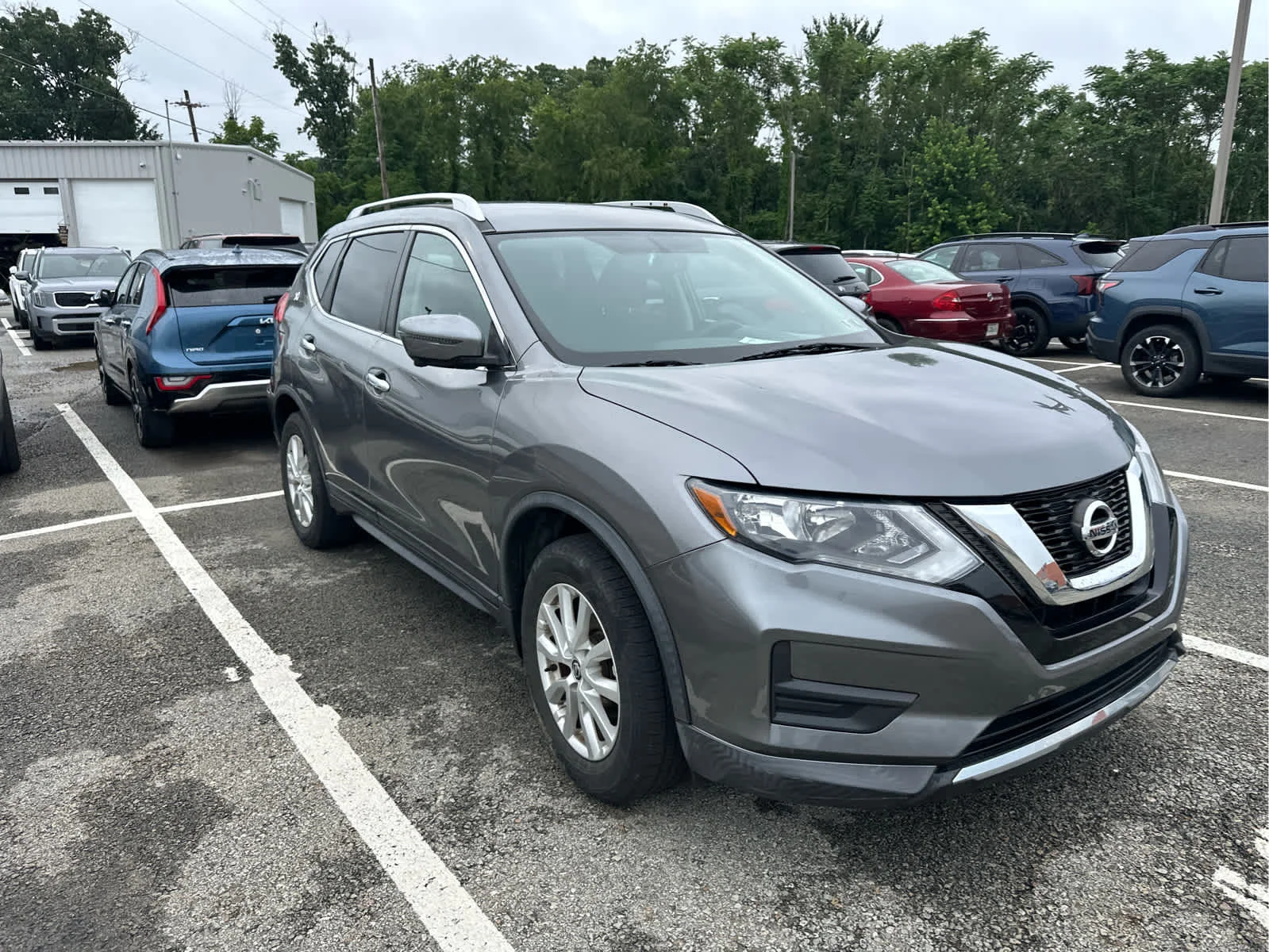 Used 2017 Gun Metallic Nissan SV image 2