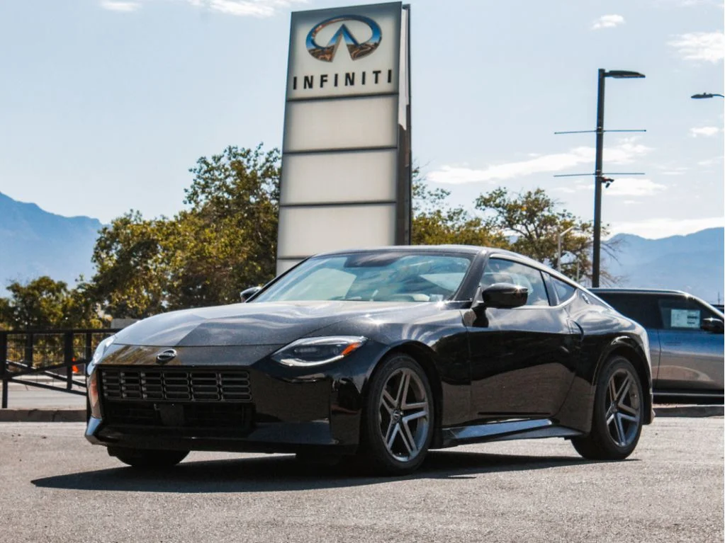 Used 2024 Black Diamond Pearl Nissan Sport image 1