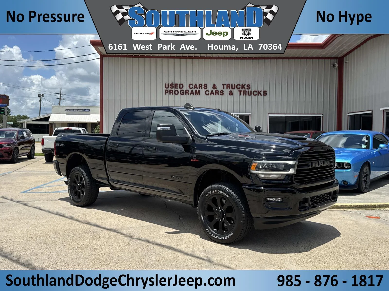 Used 2024 Diamond Black Crystal Pearlcoat Ram Laramie image 1