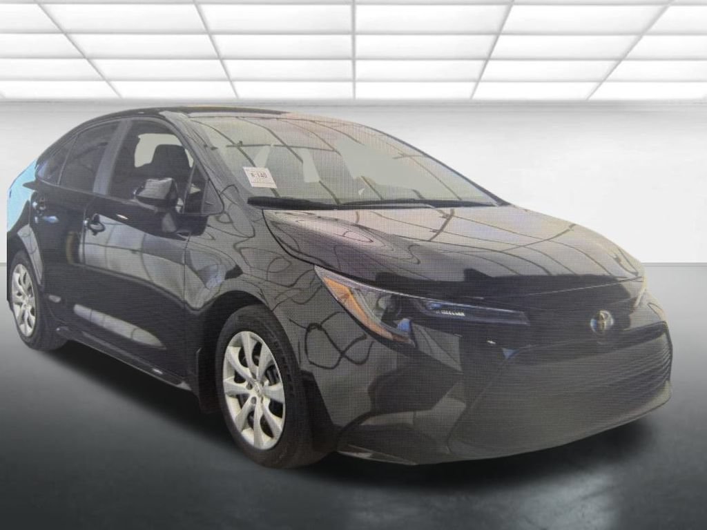 Used 2025 Black Toyota LE image 1