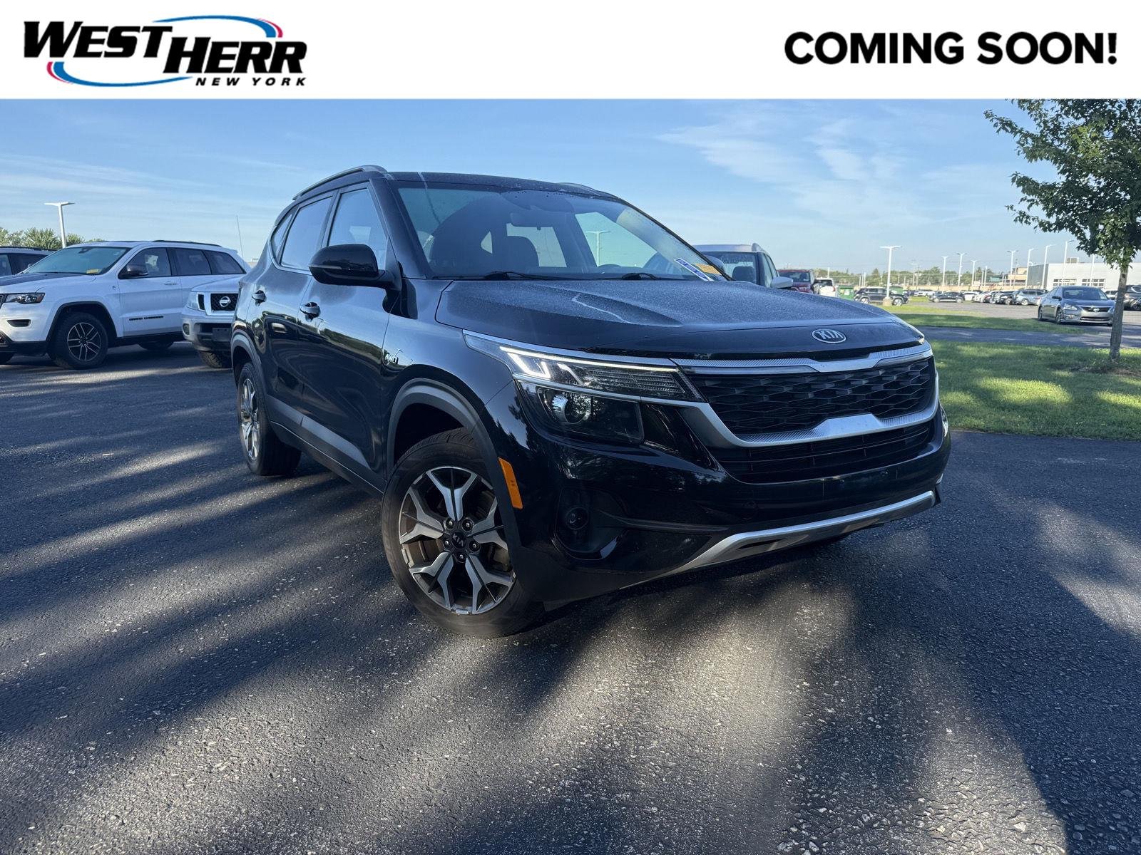 Used 2021 Cherry Black Kia EX image 1