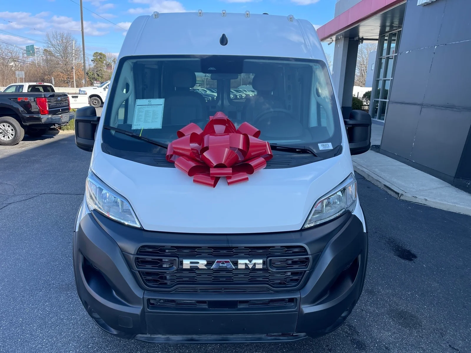 Used 2023 Bright White Clearcoat Ram High Roof image 2