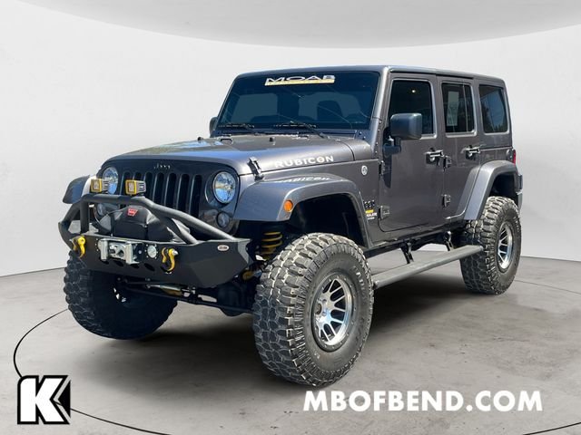 Used 2016 Gray Jeep Unlimited Rubicon image 1