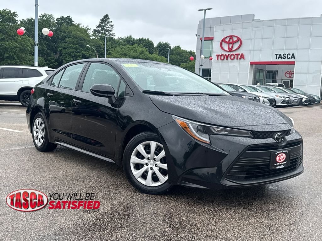 Used 2024 Black Toyota LE image 1