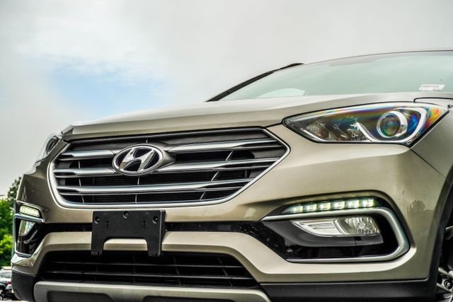 Used 2018 Hyundai Santa Fe Sport with VIN 5NMZU3LB8JH097556 for sale in Canton, GA
