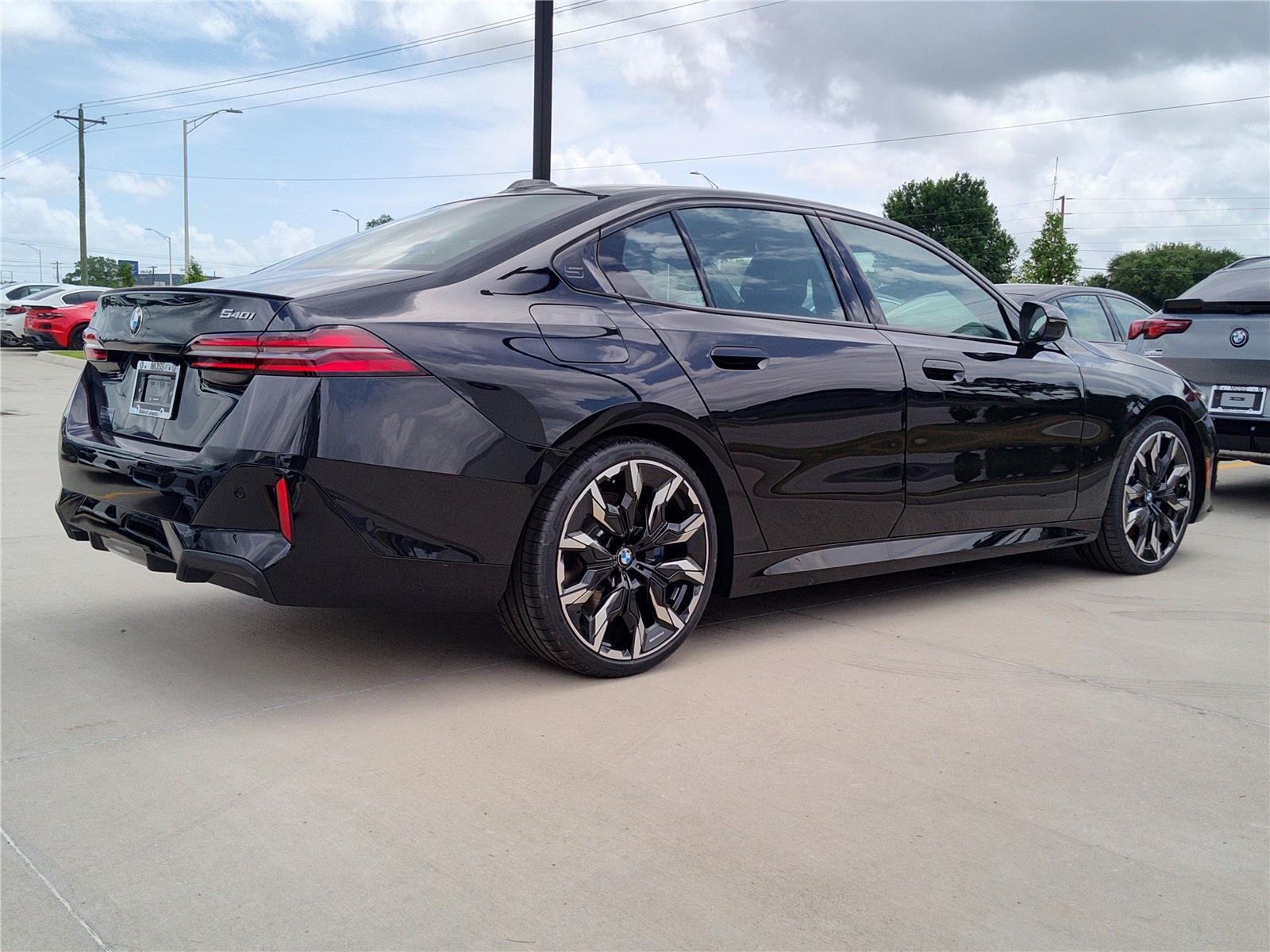 New 2027 Black Sapphire Metallic BMW 540i xDrive image 4