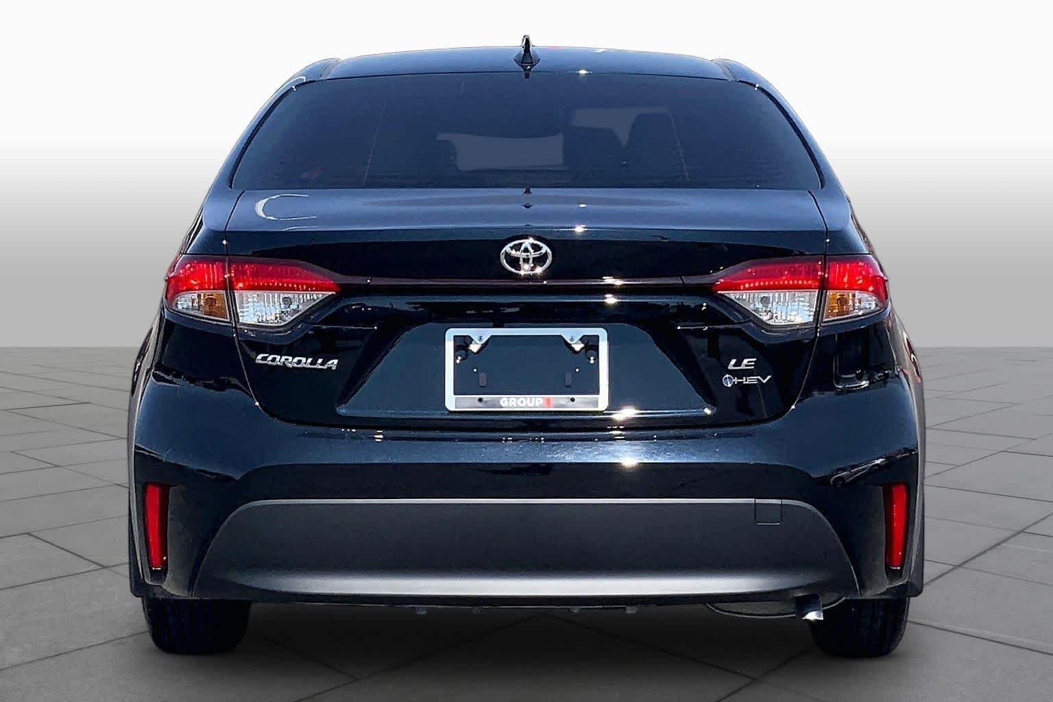 Used 2026 Midnight Black Metallic Toyota Hybrid LE image 5