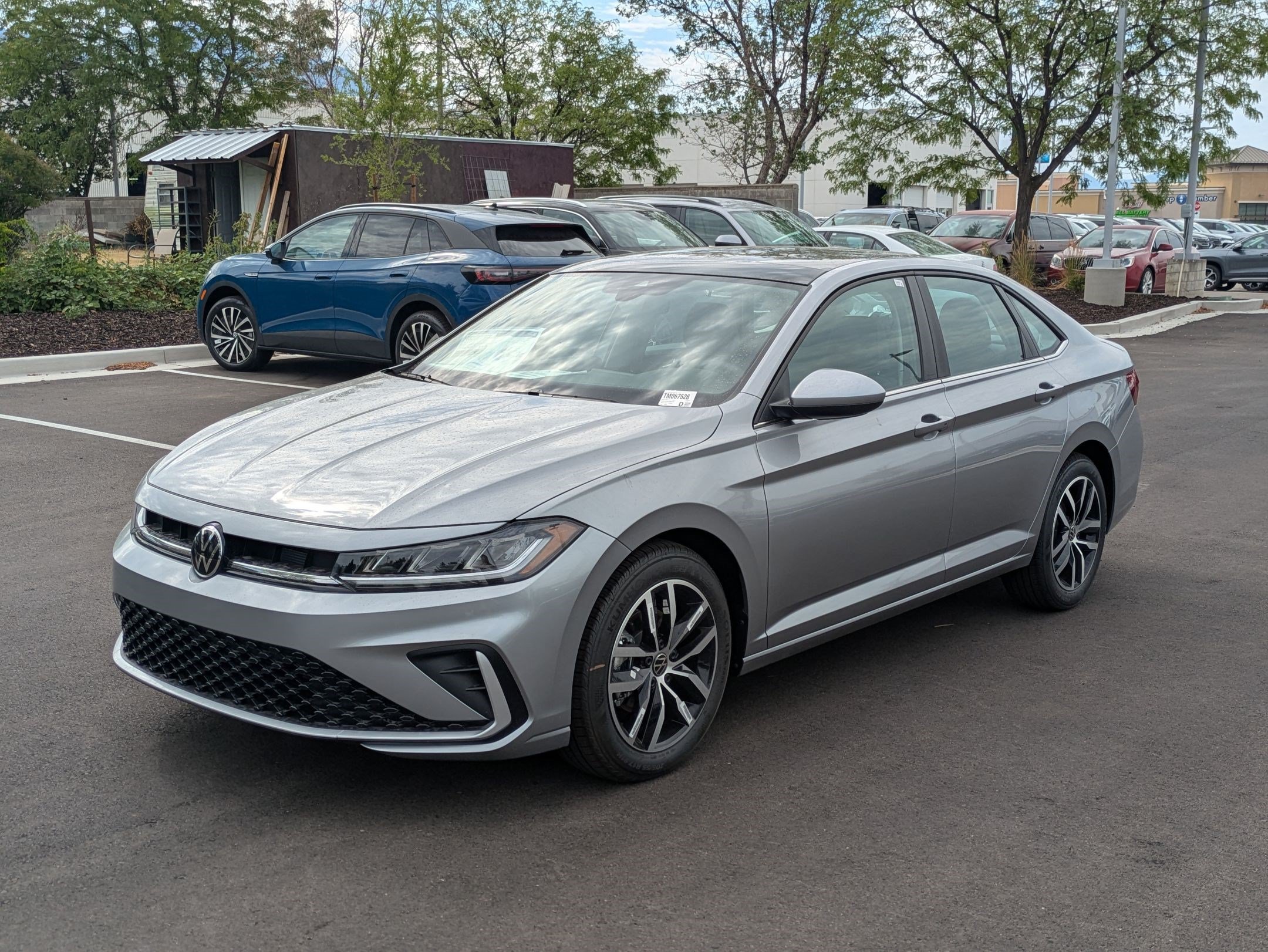 New 2026 Pyrite Silver Metallic Volkswagen SE image 8