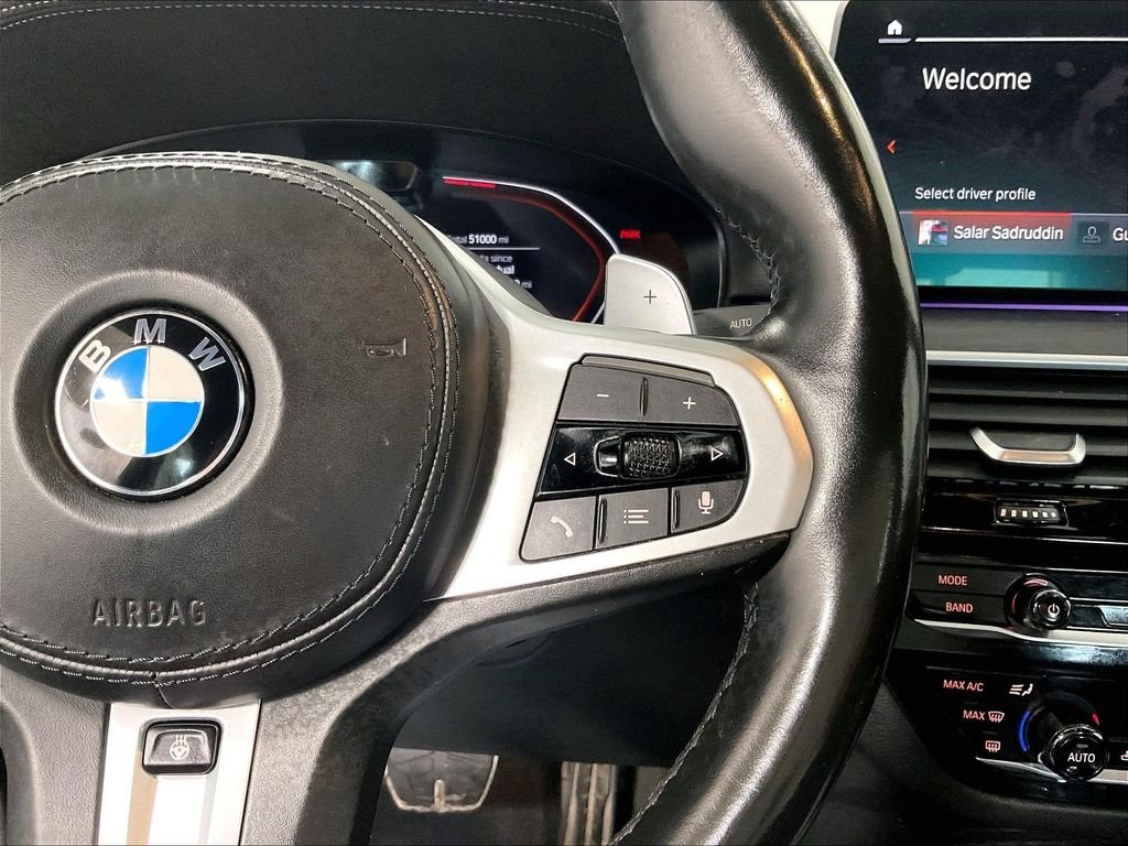 Used 2022 Black BMW M550i xDrive image 24