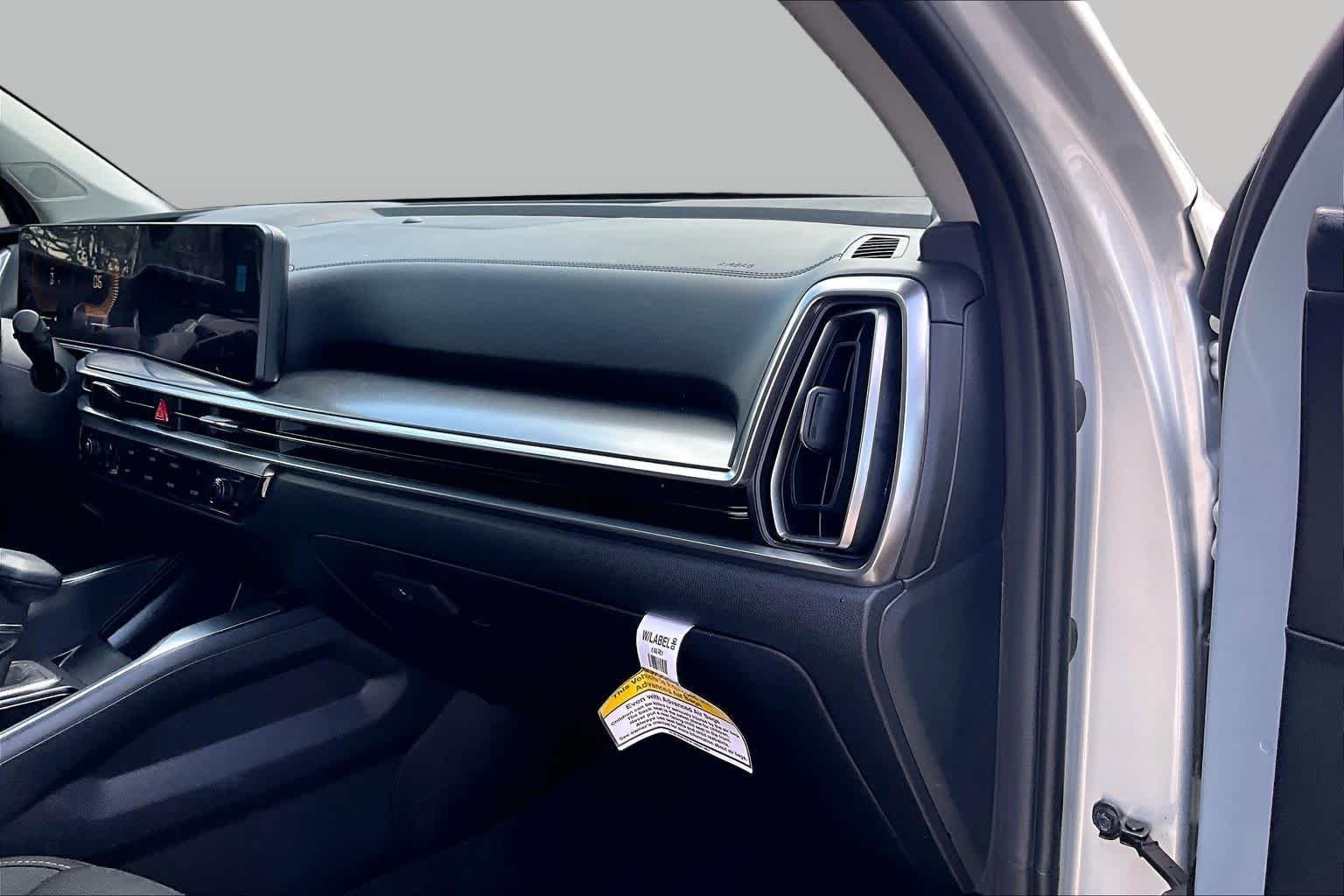 New 2026 Ivory Silver Kia LX image 16