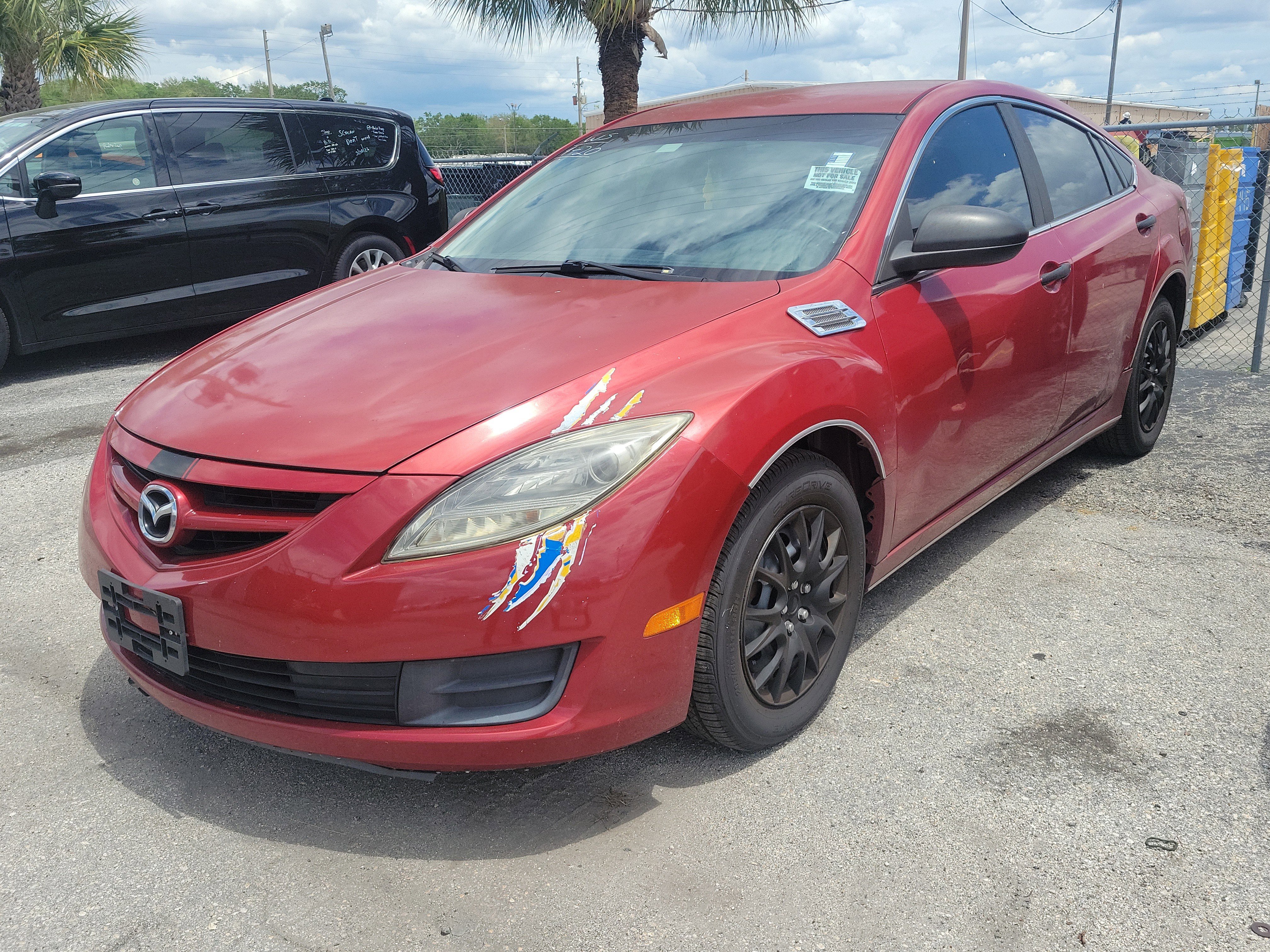 Used 2010 Sangria Red Mica Mazda i Sport image 1