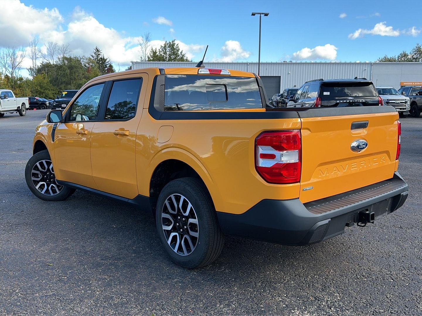 Used 2023 Cyber Orange Metallic Tri-Coat Ford LARIAT image 3