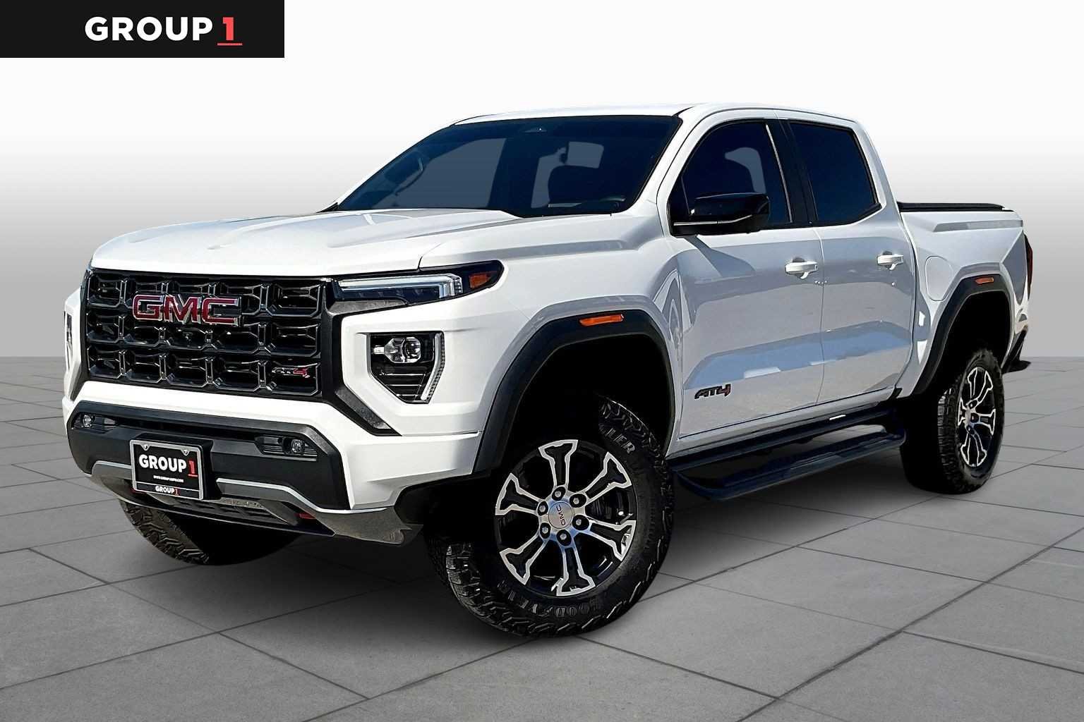 Used 2023 Summit White GMC AT4 image 1
