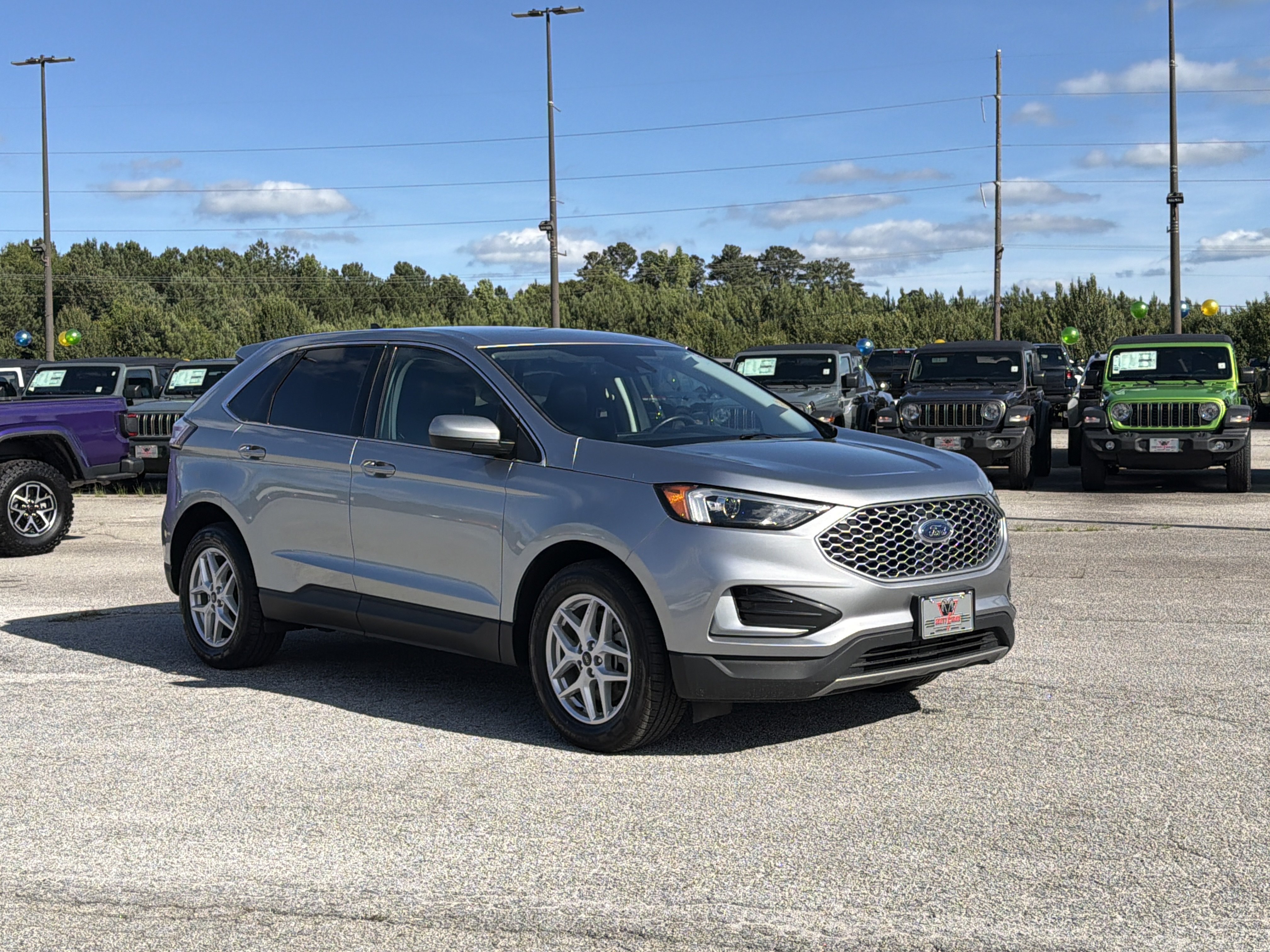 Used 2023 Silver Metallic Ford SEL image 2