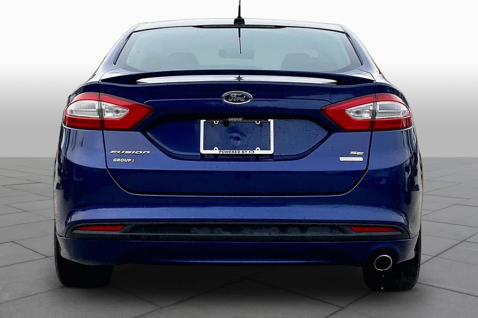 Used 2013 Deep Impact Blue Ford SE image 5
