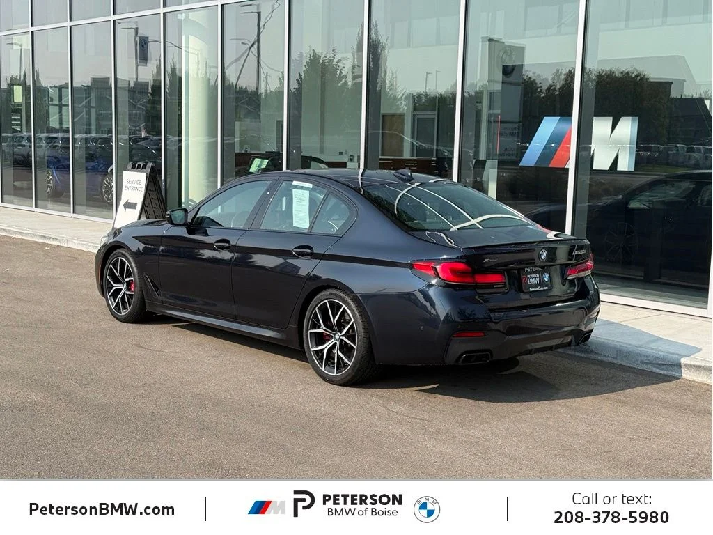 Used 2023 Black BMW M550i xDrive image 3