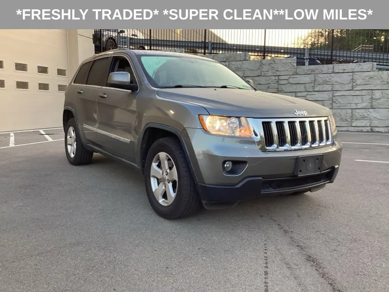 Used 2011 Gray Jeep Laredo image 1