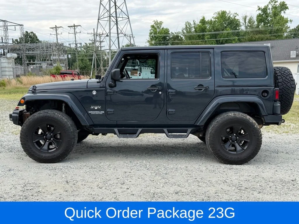 Used 2017 Black Jeep Unlimited Sahara image 9