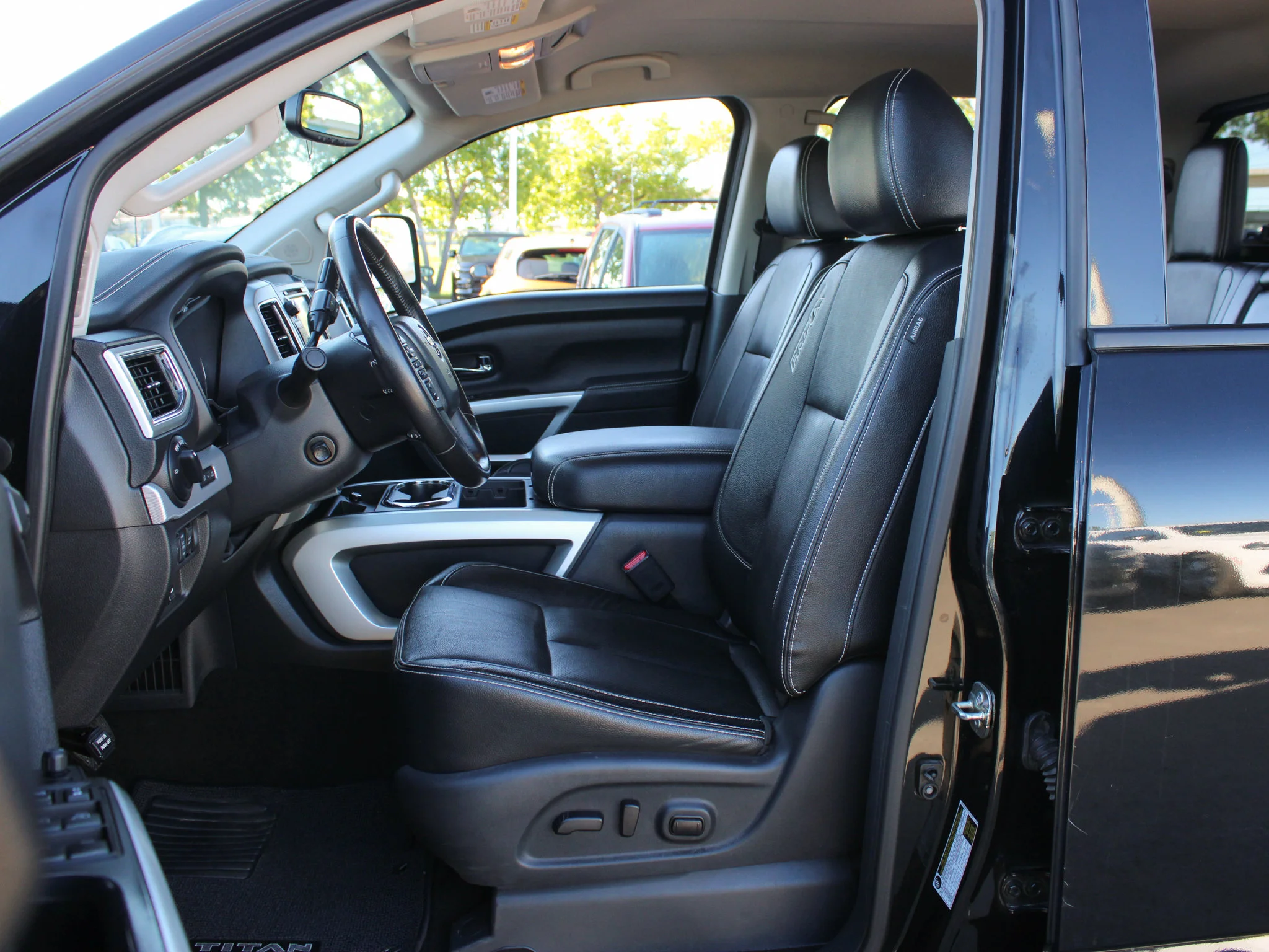 Used 2018 Black Nissan PRO 4X * 3M PPF | 5.6L V8 | Tonneau Cover | 360 Camera | Tow Tech | Rockford Fosgate | Nav image 3