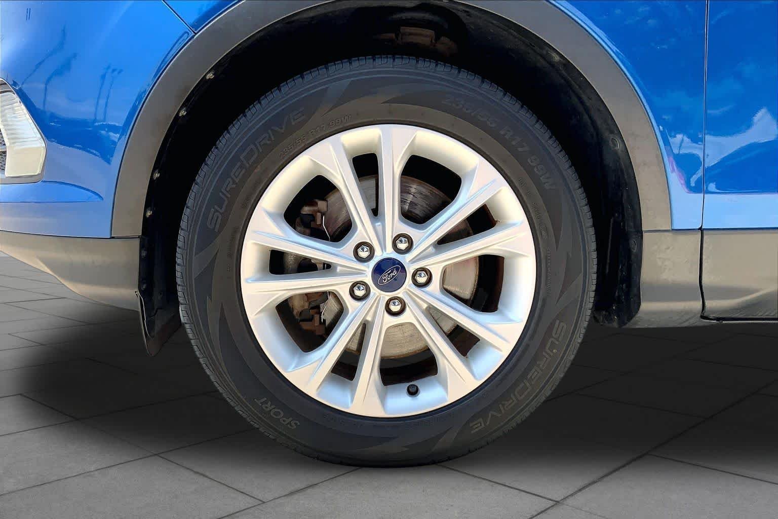 Used 2017 Lightning Blue Metallic Ford SE image 11