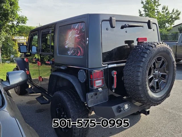 Used 2014 Jeep Wrangler Unlimited Sport with VIN 1C4BJWDG7EL205708 for sale in Benton, AR