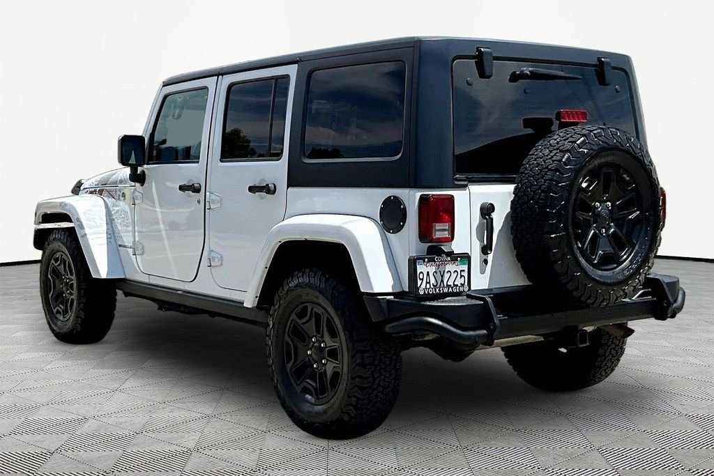 Used 2016 White Jeep Unlimited Sahara image 4