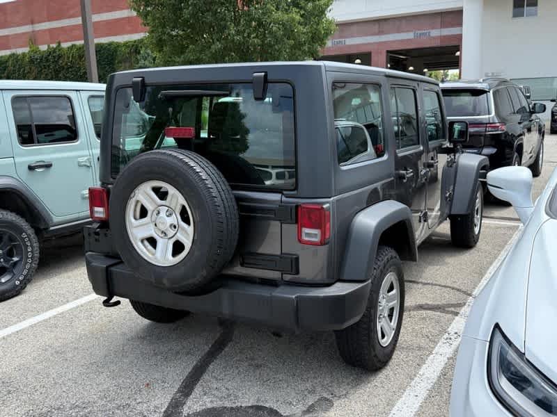 Used 2018 Granite Crystal Metallic Clearcoat Jeep Sport image 4