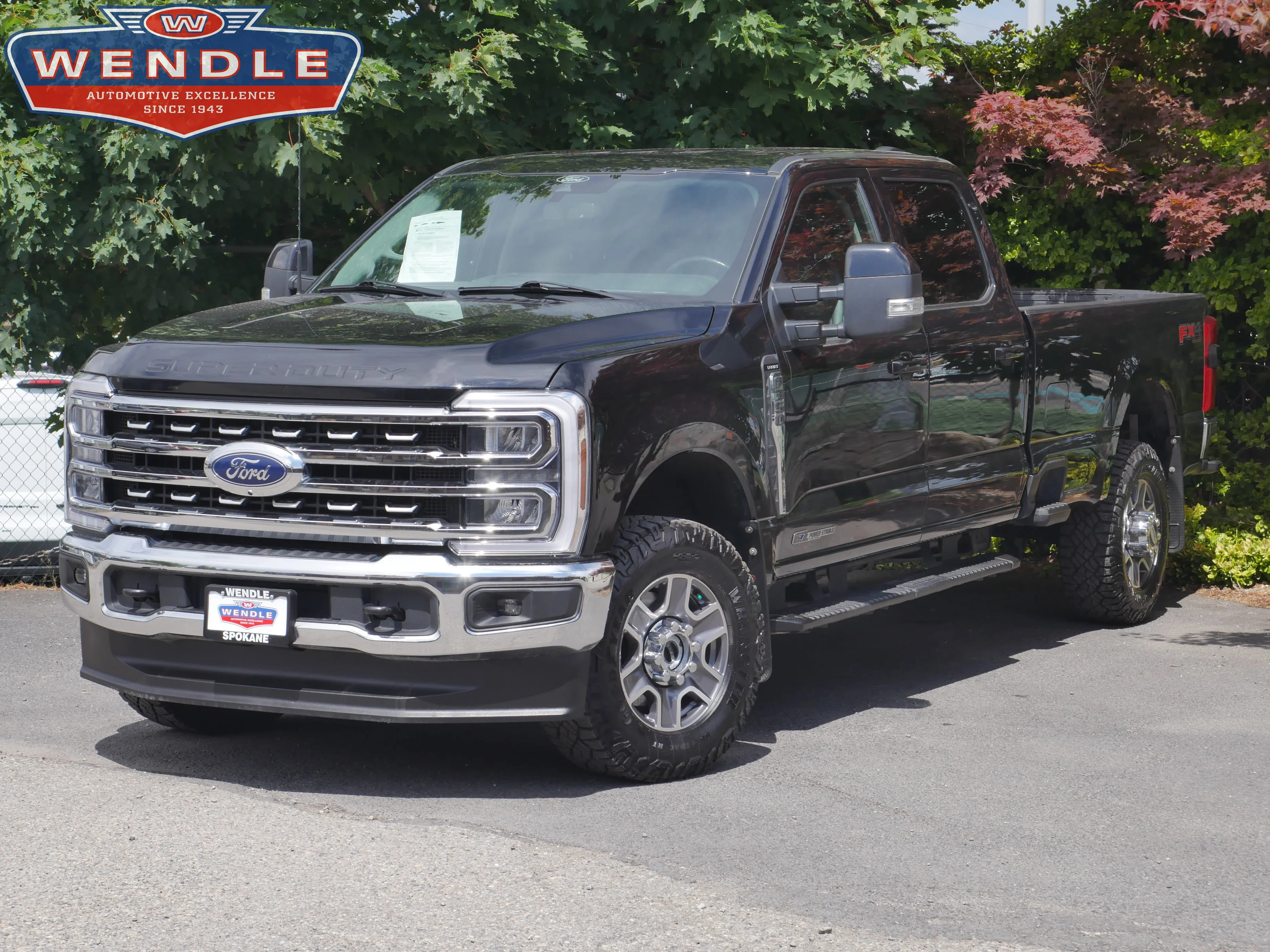 Certified Used 2024 Agate Black Metallic Ford LARIAT image 1