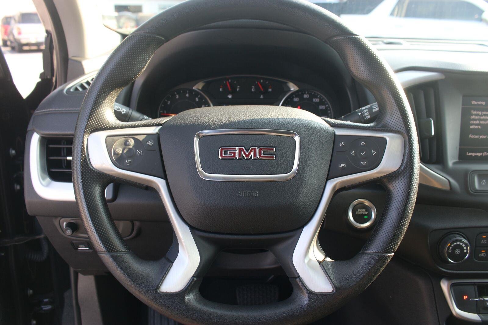 Used 2024 Ebony Twilight Metallic GMC SLE image 19