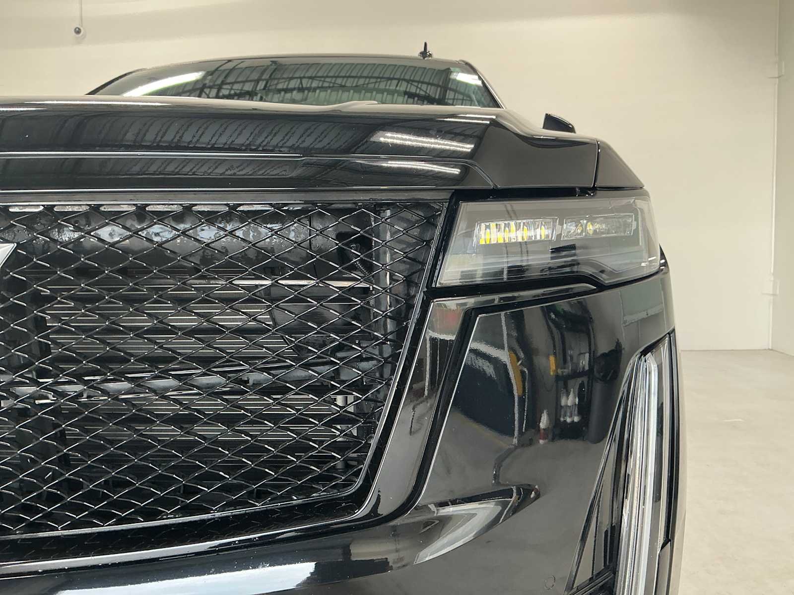 Used 2024 Black Raven Cadillac 4WD Sport image 7