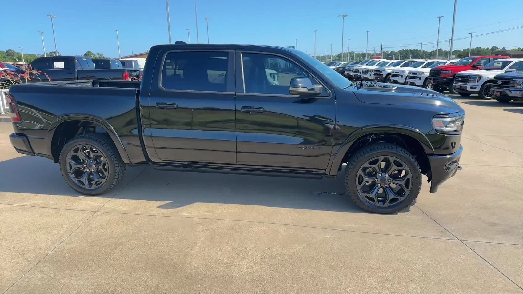 Used 2023 Diamond Black Crystal Pearlcoat Ram Limited image 2