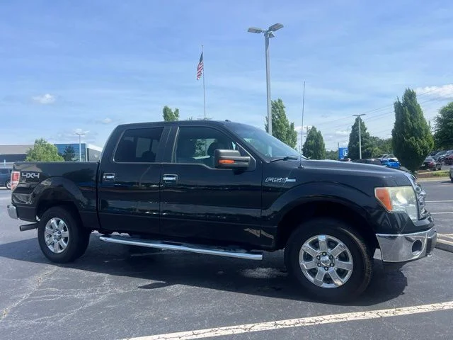 Used 2014 Tuxedo Black Metallic Ford XLT image 4